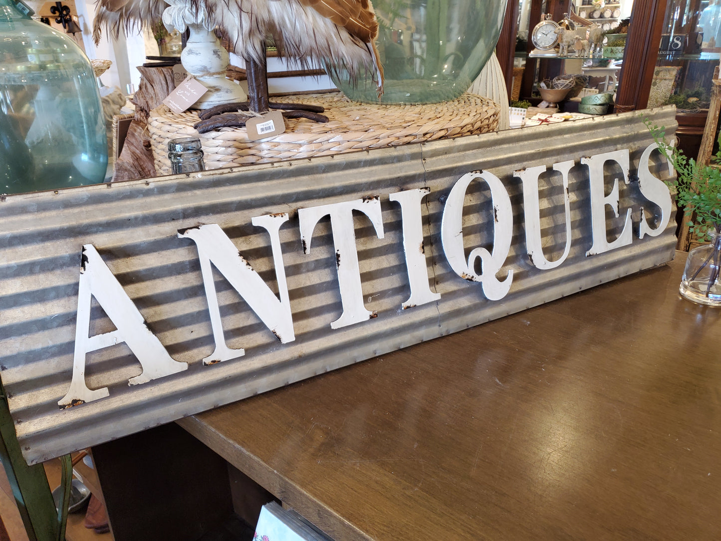 Metal 'Antiques' Sign