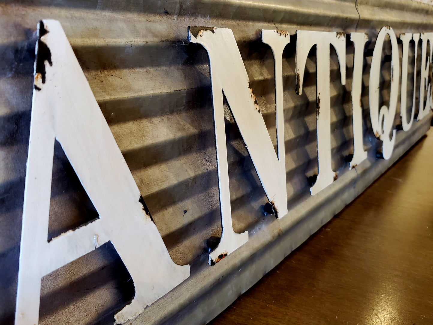 Metal 'Antiques' Sign